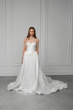 The Amelie shade captures the essence of French elegance, softness, and timeless romance — designed for brides who envision a refined and effortlessly graceful look on their wedding day. Inspired by Parisian femininity and delicate beauty, this shade beautifully complements the aesthetic of the Amelie wedding dress, creating a harmonious and sophisticated bridal style from makeup to gown.