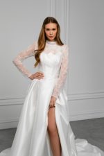 The Catherine  wedding dress is a tribute to refined royal elegance, inspired by the iconic bridal style of Kate Middleton, who brought lace sleeves back into modern wedding fashion and redefined timeless bridal sophistication. Designed for brides who appreciate grace, femininity, and classic beauty, this gown embodies aristocratic charm with a contemporary touch.